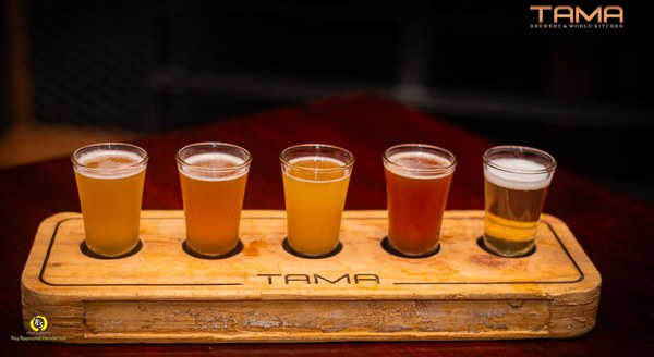 Tama Brewery & World Kitchen logo