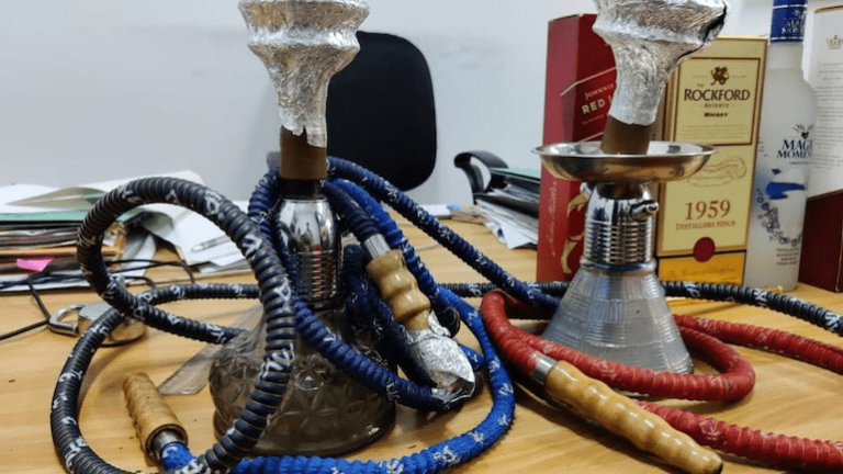Delhi: Cafe owner arrested for serving alcohol; hookah illegally, 32 booked for violating Covid norms